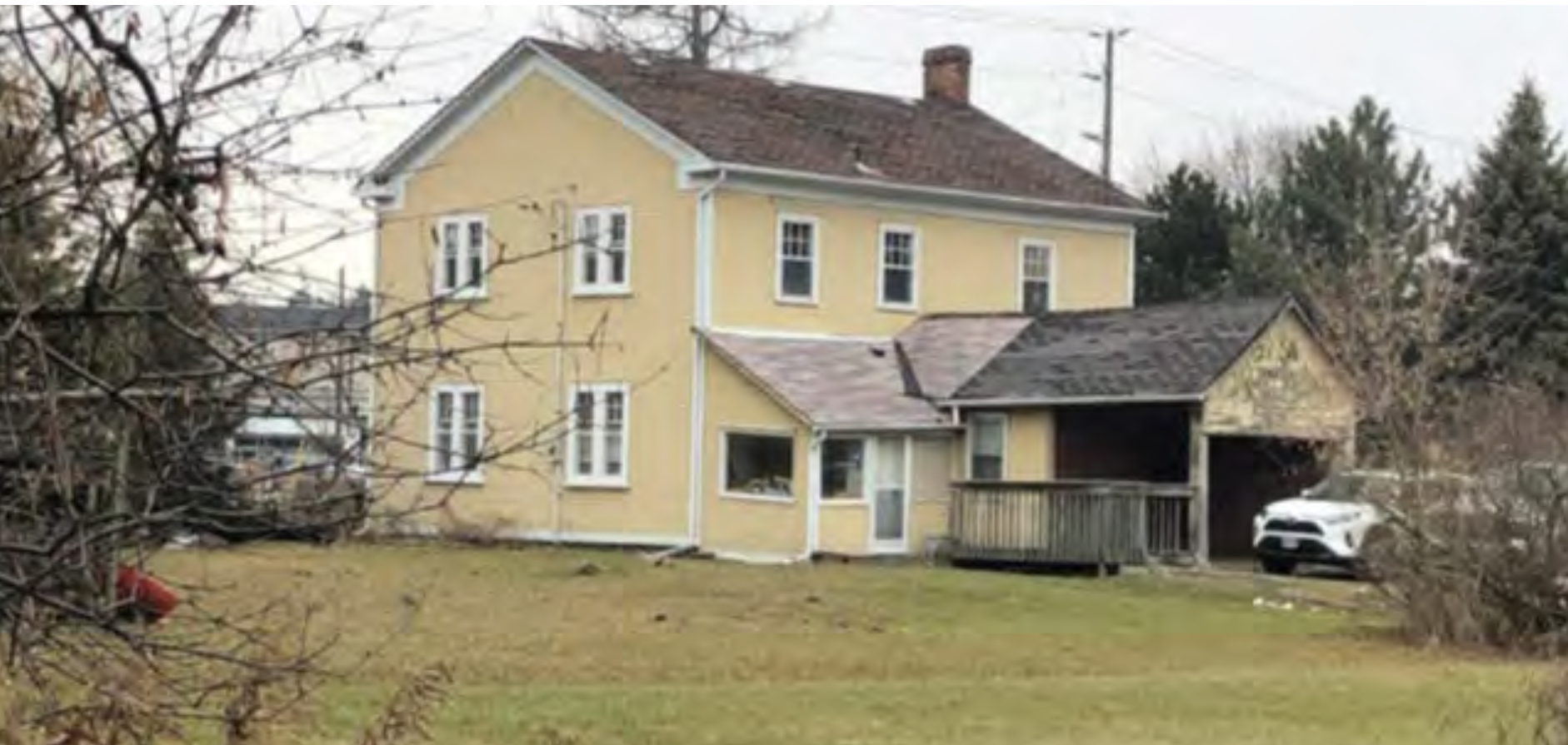 View looking northeast towards the west and south elevations.84